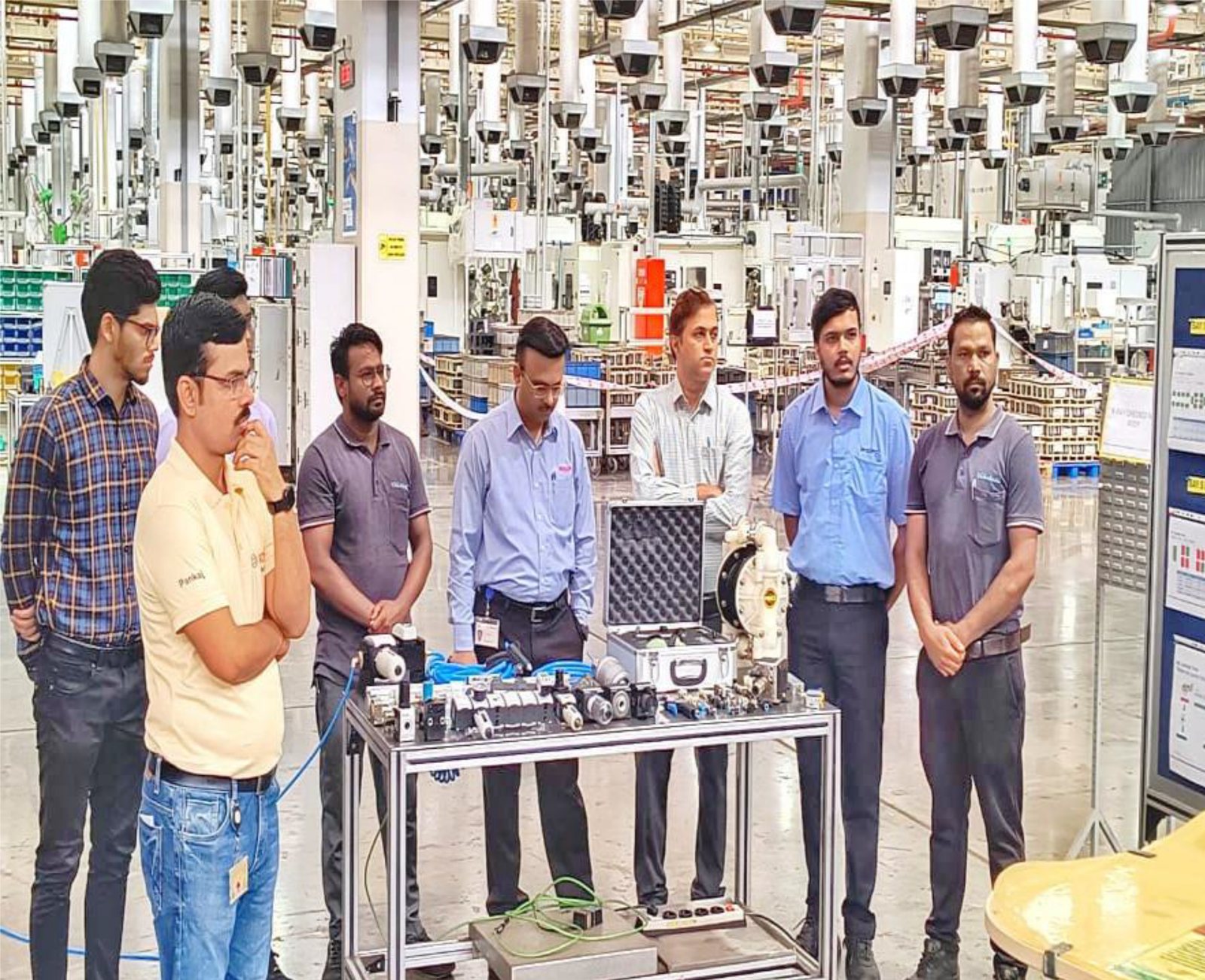 Team at an assembly line