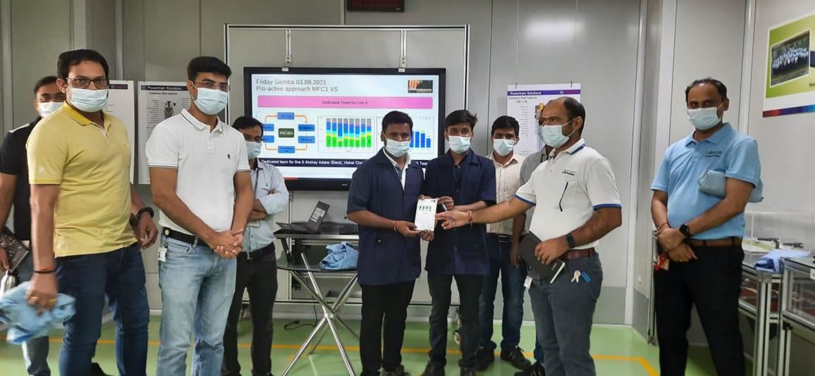 Team presenting a completed project to the client