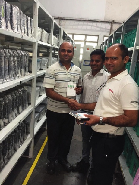 Yoganand team member being recognised by a client at the plant